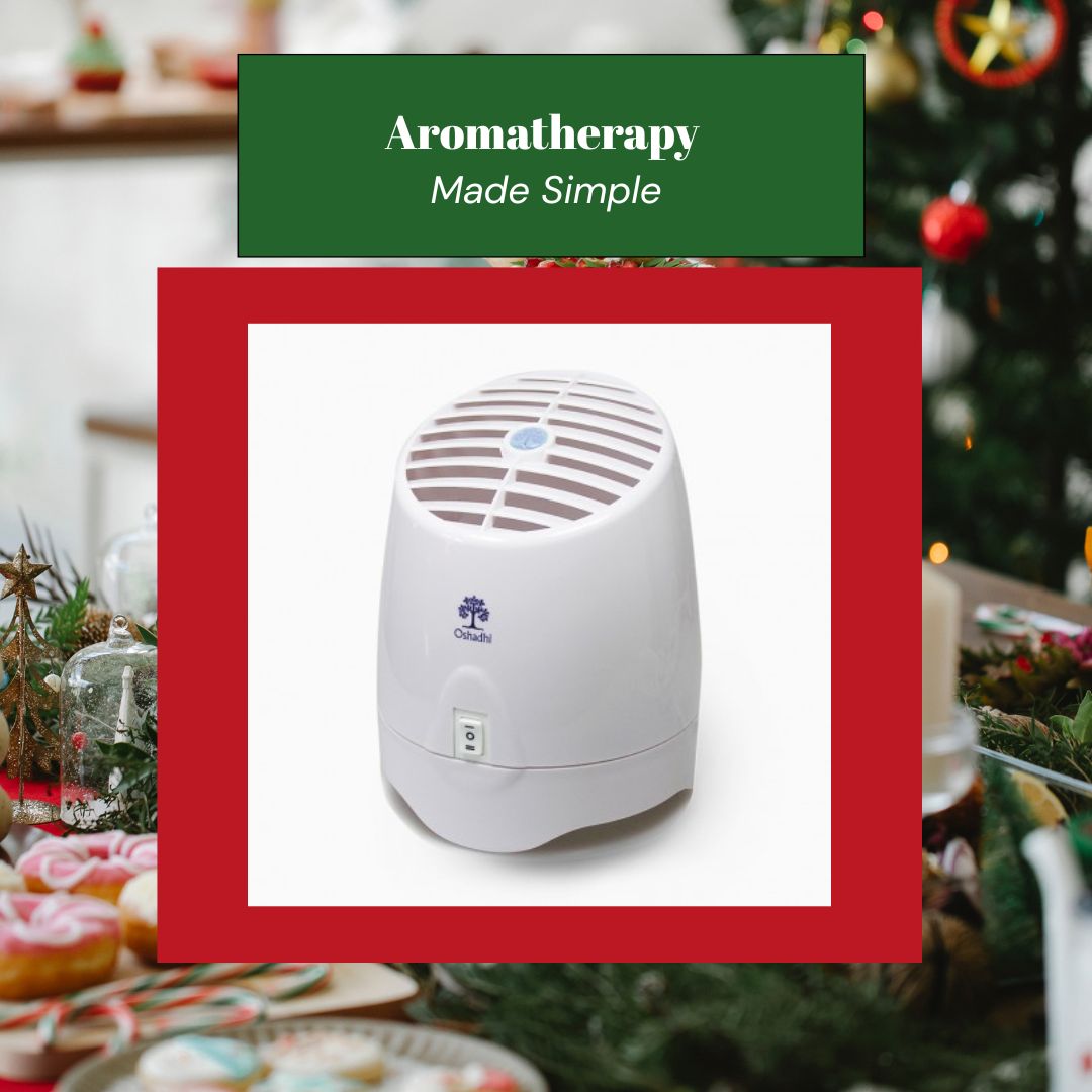 White diffuser with a Christmas tree and food in the background, labeled 'Aromatherapy Made Simple'.