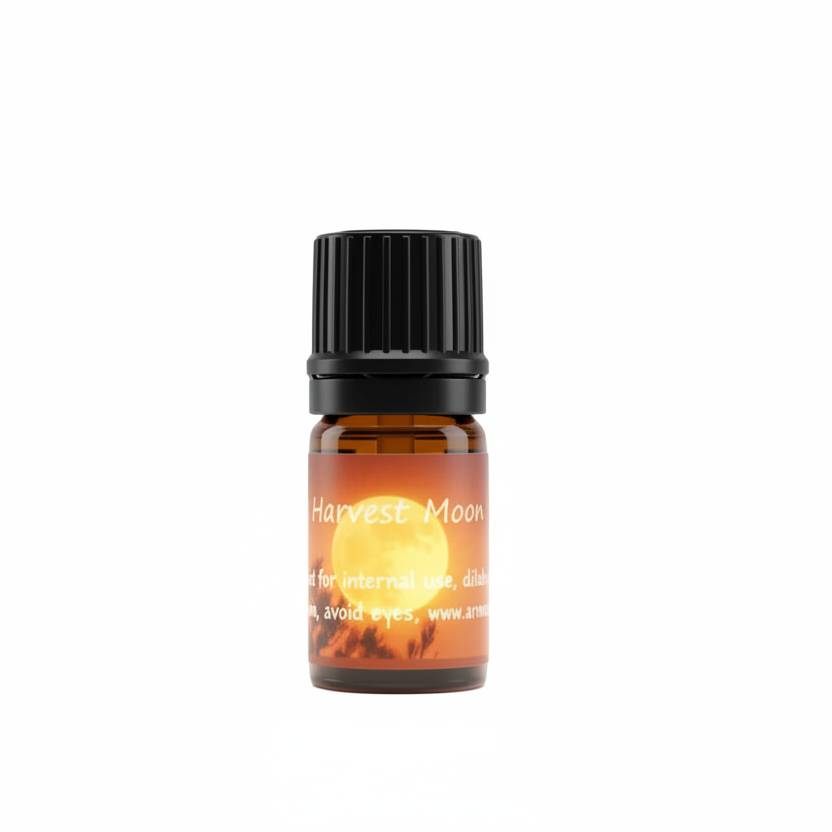 A small amber glass bottle with a black ribbed cap and a label reading 'Harvest Moon' on a plain white background.