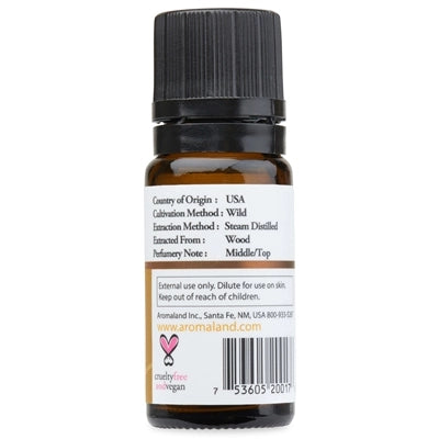 Bottle of essential oil with ingredients on a white label on a white background