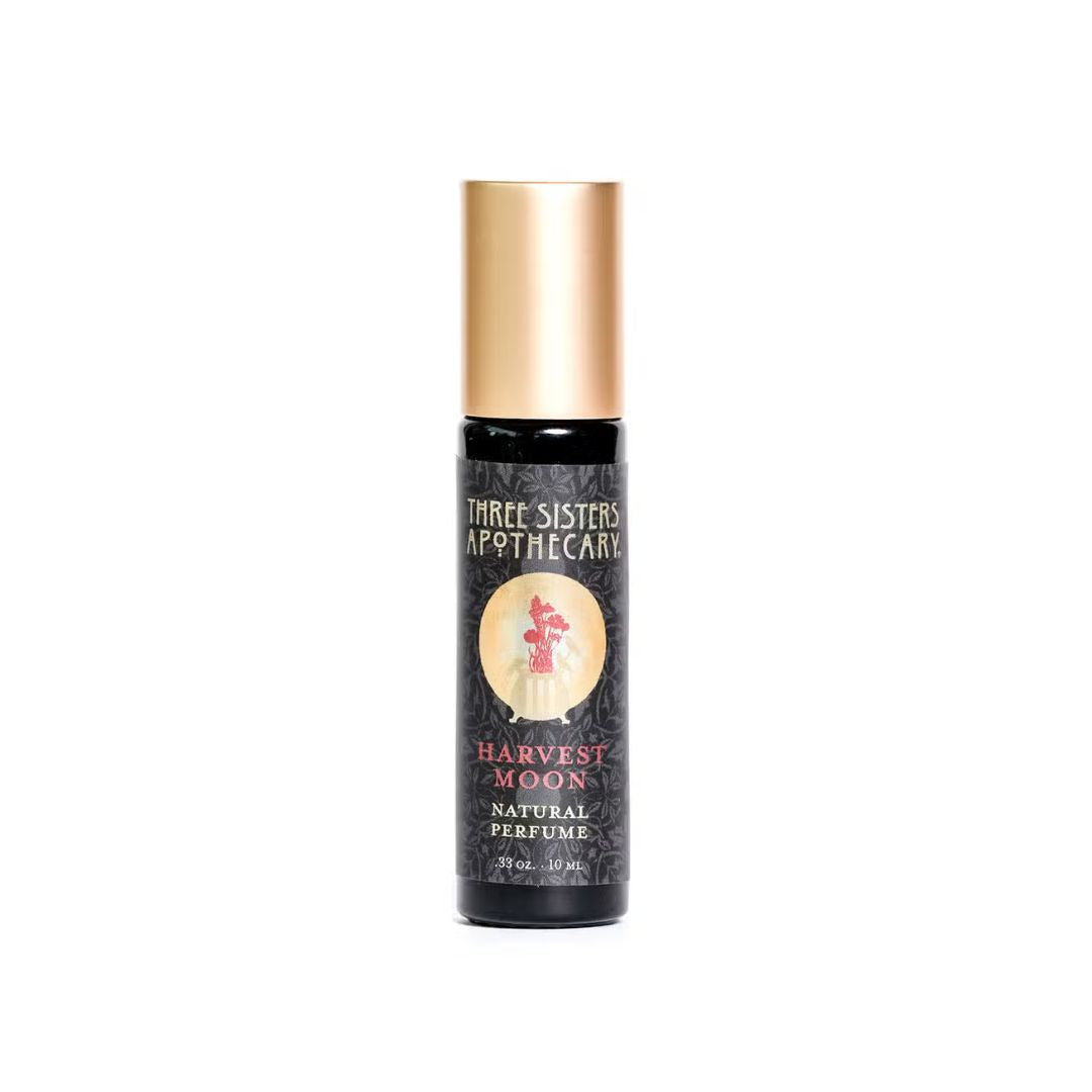 a bottle of harvest moon natural perfume