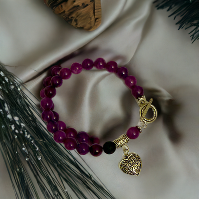Video showing details of Amethyst essential oil diffuser bracelet with silver heart charm